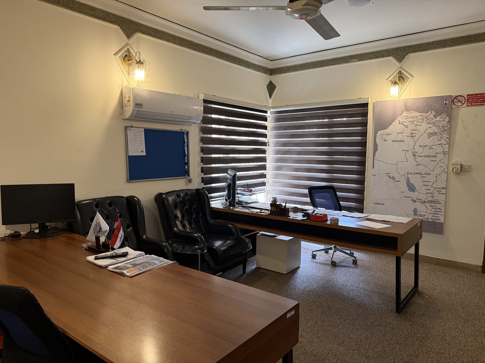 An office at our Mosul office, with a wall map