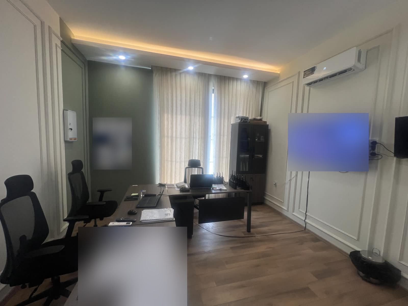 The operations office with a tracking screen and radios